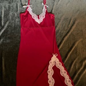 Red slip dress with white lace trim